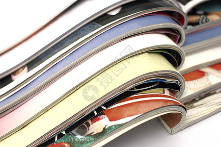白背景上的堆叠杂志电子书小册子团体白色打印娱乐产品报纸阅读市场图片