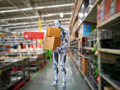 智能机器人技术在仓库模糊背景中代替人类持有箱子图片
