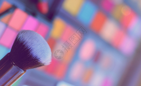色彩多彩的化妆品色调色板艺术刷子眼睛产品工具成套紫色收藏艺术家口红图片