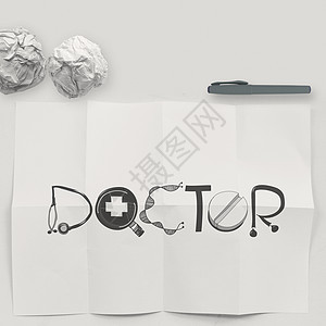 在白色折叠纸和纹理上设计DOCTOR字词图片