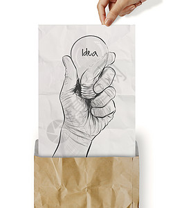 手画灯泡 在折叠纸上用民主选举学会的文字作为封顶成就风暴创造力草图海报浪费文档商业领导展示图片