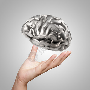 商务人士手显示 3d 金属人脑作为概念药品草图学习图表科学创新科学家器官医疗战略图片