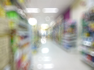 具有模糊bokeh背景的超市杂货食物店铺顾客奶制品产品折扣球童圆圈走道图片