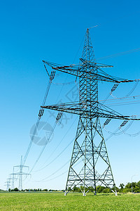 电塔和输电线路天空蓝色活力电缆接线危险技术桅杆电压紧张背景图片