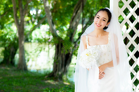 早上在户外的亚洲新娘花束庆典幸福白色女性女孩女士成人裙子图片