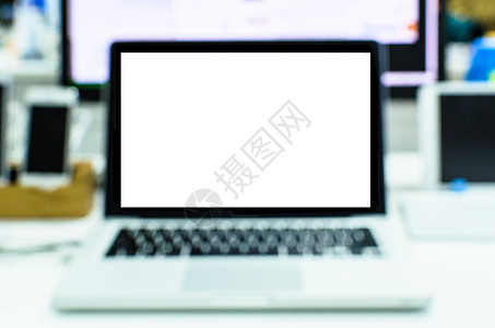 膝上型电脑正用于工作办公室咖啡商业杯子平板白色桌子笔记本房间屏幕图片