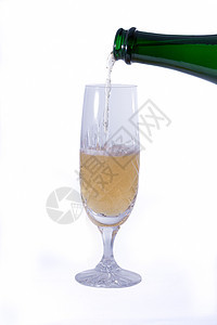 香槟倒在玻璃杯中水晶纪念日液体派对饮料嘶嘶周年气泡庆典白色图片