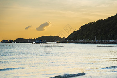 黎明时的塔文海滩照片 太阳升起 早晨全景蓝色海洋冲浪摄影海浪假期季节反射风景图片