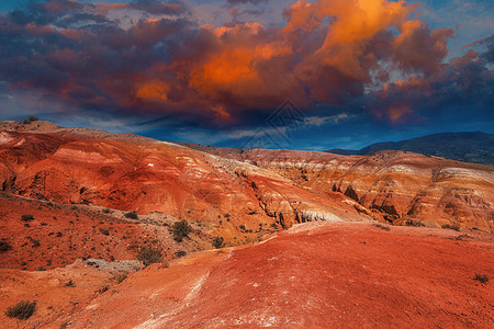 日落的火星地貌岩石橙子彩色天空行星石头风景旅行太阳爬坡图片