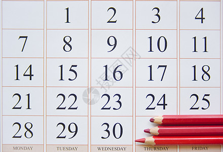 日历和最后日期附近的三支红铅笔日记假期时间办公室床单日程经期数字文档记事本图片