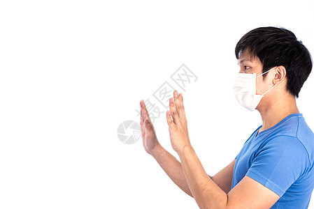 身穿蓝色T恤衫的亚洲青年男子顶罩和医疗面具以保护细菌病人感染呼吸面罩衬衫卫生呼吸保健伤害男人图片