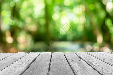 空的旧木头有选择性地聚焦于布基背景的模糊自然模糊公园办公室解决方案桌子海报花园森林木板材料树叶笔记图片