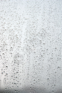 雨天车窗户上有雨滴天空水滴环境蒸汽气候宏观天气水分玻璃背景