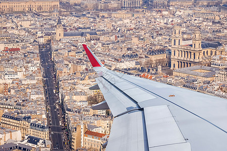 来自飞机窗口的  巴黎城市视图日落运输航班天际旅行景观商业引擎地平线旅游图片