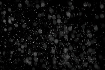 黑色背景纹理上的白雪雪花魔法季节暴风雪假期降雪运动白色风暴插图图片