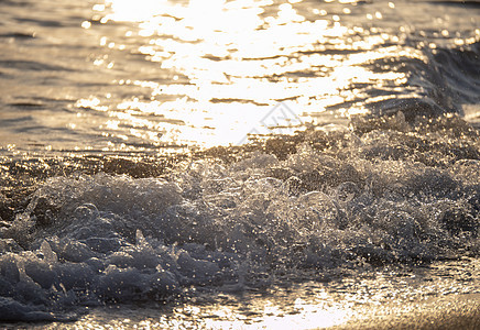 海边海滩 特写日出气泡环境蓝色运动海浪海洋戏剧性海景阳光日落图片