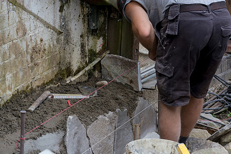 工匠加工石板水泥材料用具建筑师贸易劳动者摄影美化维修安装图片