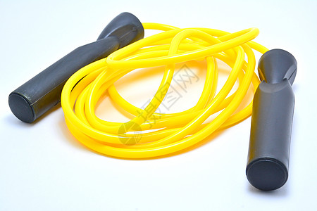 黄黄色塑料运动跳绳工作细绳训练反射活动火车环形黄色绳索图片