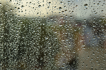 下雨天撑伞窗户下着雨 下雨天灰色液体雨滴气泡玻璃天气背景