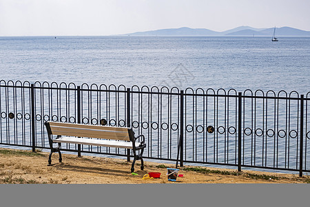 海岸和海景的长坐座位旅游太阳晴天长椅天堂天空旅行假期支撑图片