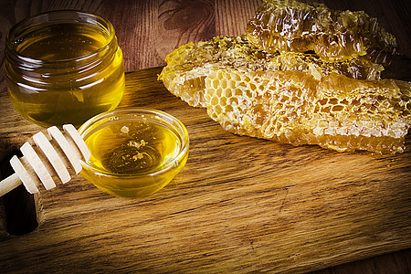 蜂蜜和蜂窝橙子营养产品梳子金子甜点药品细胞蜂蜜液体图片