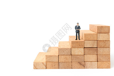 与世隔绝的木块上站着的商务人士利润商务正方形思考进步木头商业人士工作成功图片