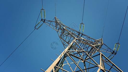 日落时大型发射塔线路技术电压电力工业框架日光金属天空力量图片
