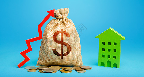 与红色向上箭头和住宅楼的美元钱袋子 房地产成本的恢复和增长 增加投资回报 公寓和住房价格上涨 市政预算图片