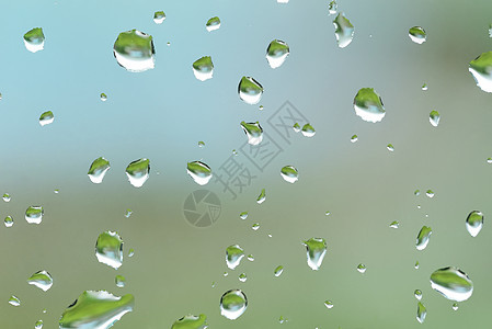 窗户上下着雨滴墙纸天气流动波纹玻璃宏观水滴环境液体气泡图片