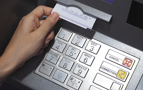 自动取款机按钮特写和纸面交易男人帐户银行业商业银行金融卡片技术密码电脑图片