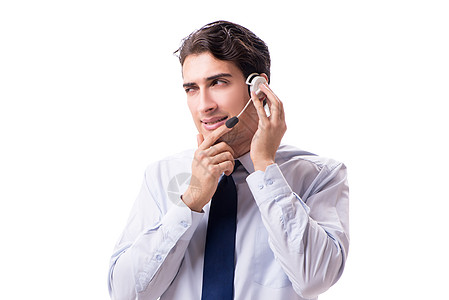 在白色背景上与耳机隔离的男子电话销售热线思维人士服务台操作员助手工作桌子顾问图片
