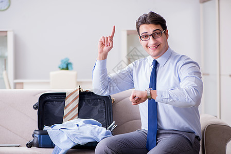 商业家为出差准备包装包工男人案件航程人士旅游管理人员手表商业套装财物图片