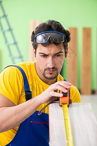 在家铺设地板的专业订约专业合同人安装承包商厘米修理工仪表硬木维修工人修理抛光图片
