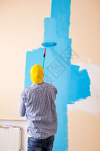 在家里画墙的油漆工装潢师刷子绘画雇用建造工具滚筒画家乐器装潢图片