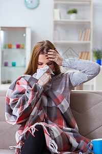 家里有流感的患病妇女手帕痛苦感染毯子鼻子卫生保健假期病人疼痛图片