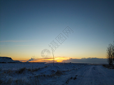 冰岛在冬天的地貌和平原景观令人难以置信冰川环境日落全景太阳旅行天空日出蓝色顶峰图片