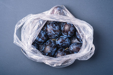 塑料袋袋中新鲜的成熟李子水果顾客市场店铺饮食食物杂货店团体回收营养销售图片