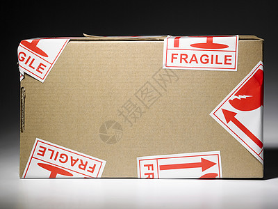 带有粘贴标签的包裹工作室邮政商品棕色邮件纸板包装对象货运纸盒图片