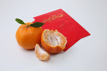 中国新年水果白色信封传统红色运气庆典展示月球繁荣图片