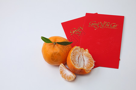 中国新年季节性白色祝福庆典季节水果仪式信封传统繁荣图片