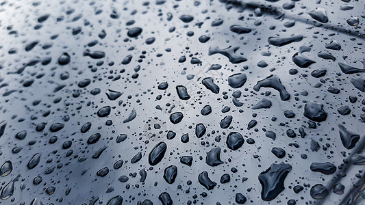 玻璃墙上的雨滴摄影雷雨水滴宏观蓝色温泉水平质感窗户天气图片