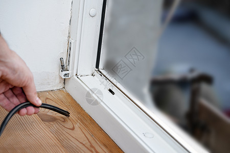 修理和安装窗户的专业硕士专业人员 改变Pvc窗户的橡胶密封胶片垫子修理工工人房子海豹工作密封剂玻璃框架装修管子图片