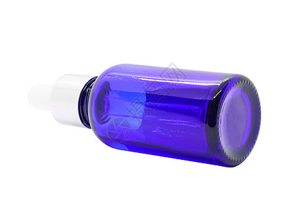 白色背景的蓝色玻璃浸泡液血清瓶包装小样保湿水滴吸管润肤护理化妆品瓶子温泉图片