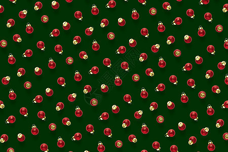 在绿色背景的圣诞节红色装饰品 背景的圣诞节装饰品构成 平躺的红色饰品庆典作品假期框架艺术新年装饰风格墙纸白色图片