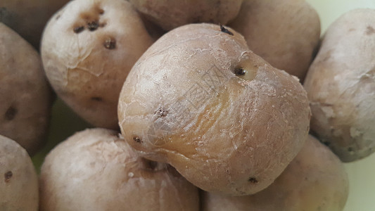 市场对新鲜有机土豆的近视 马铃薯背景质地杂货店农业淀粉花园烹饪食物营养团体饮食糖类图片