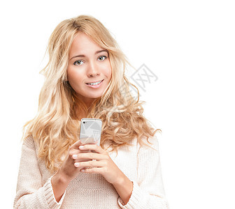 年轻漂亮的女人 现代电话在白色上头发工具微笑细胞工作室快乐女性女孩技术美丽图片