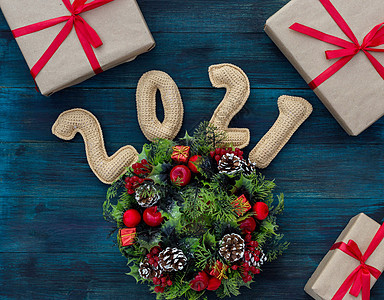 圣诞节背景 2021年编织编号 礼品和装饰花圈惊喜风格饰品庆典圣诞礼物丝带复古假期圣诞纸板图片