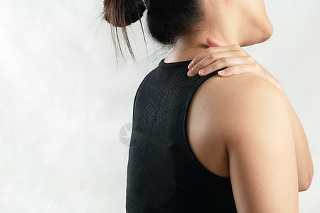 女青年颈部和肩部疼痛伤害 保健和医疗a背痛压力身体学习皮肤药品治疗肌肉手指女孩图片