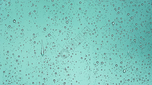 近距离观察雨滴从车窗流下窗户焦点挡风玻璃蓝色下雨天噪音曝光电影气泡水滴图片