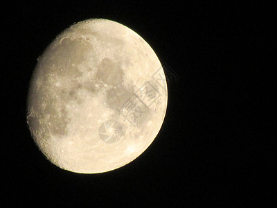 夜里地球月亮在黑色背景中发光月光视图行星望远镜灰色太空探索天文学摄影满月卫星图片